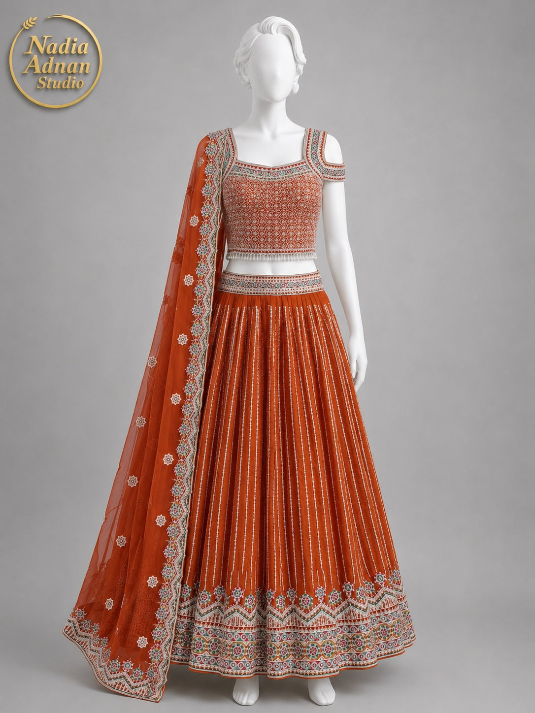 RUST ORANGE-RED CHIFFON LEHENGA -M front view - Rust Orange-Red Chiffon Lehenga by Nadia Adnan Studio