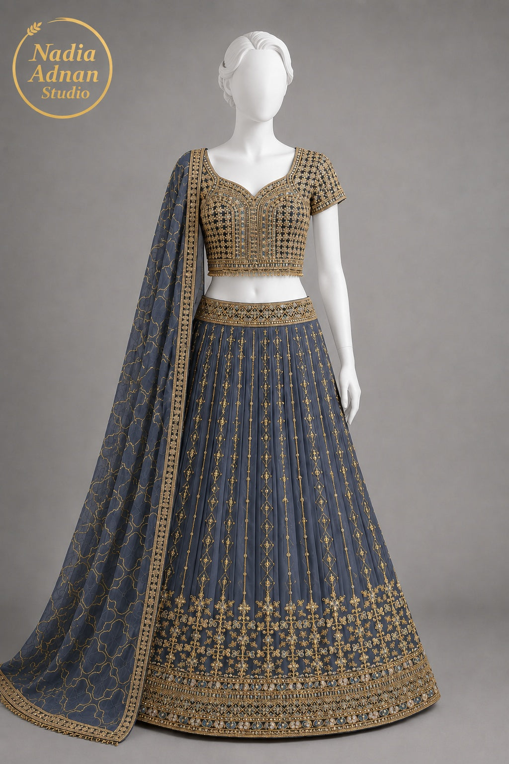 NAVY AND ANTIQUE GOLD CHIFFON LEHENGA -M front view - Navy And Antique Gold Chiffon Lehenga by Nadia Adnan Studio
