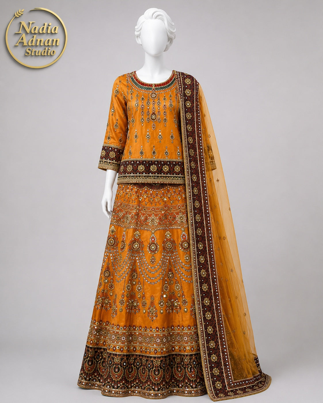 MUSTARD ORANGE MULTICOLOR ORGANZA LEHENGA -M front view - Mustard Orange Multicolor Organza Lehenga by Nadia Adnan Studio